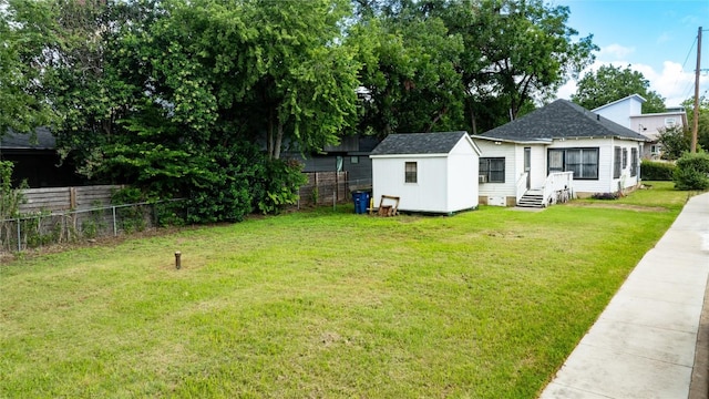 1909 E 14th St, Austin, TX 78702 - view of yard with a storage unit