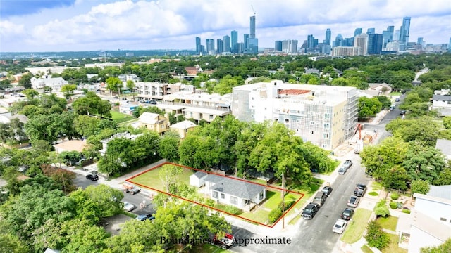 1909 E 14th St, Austin, TX 78702 - aerial overview of property's location featuring skyline and property boundaries highlighted