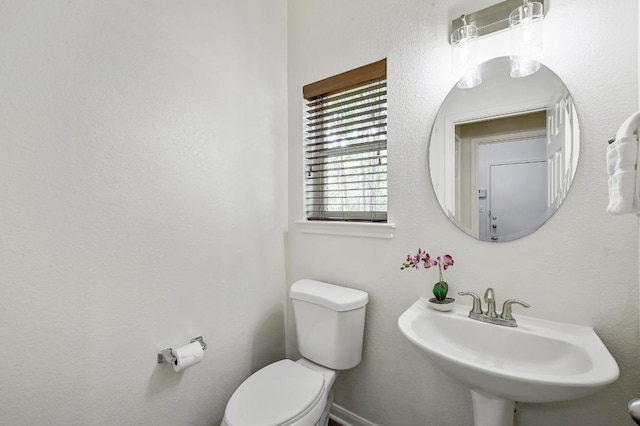 12600 Grimes Ranch Ct, Austin, TX 78732 - bathroom with toilet and a sink