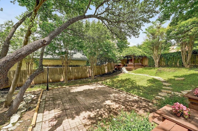 12600 Grimes Ranch Ct, Austin, TX 78732 - fenced backyard featuring a patio area