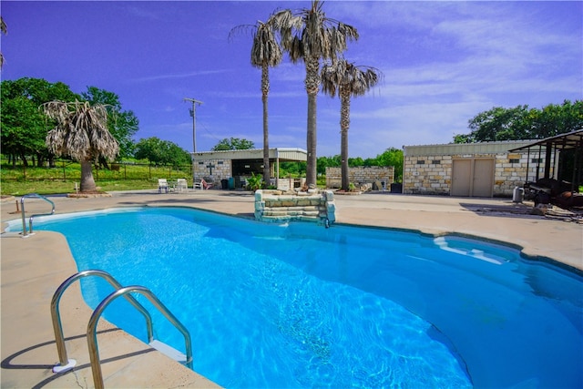 view of pool with a patio area