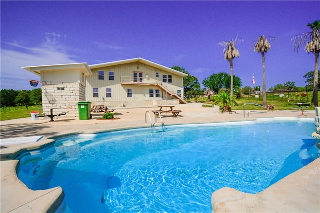 view of pool featuring a patio area