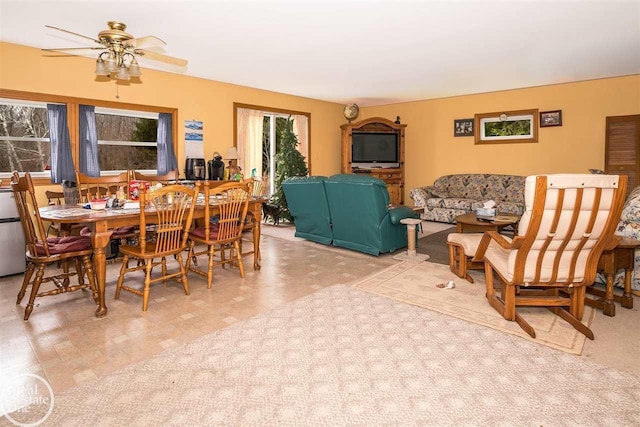 dining area with ceiling fan