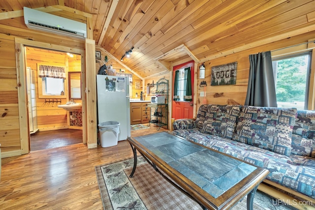 living room with an AC wall unit, wooden walls, and wood ceiling