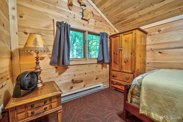 bedroom with vaulted ceiling, wood walls, dark colored carpet, baseboard heating, and wooden ceiling