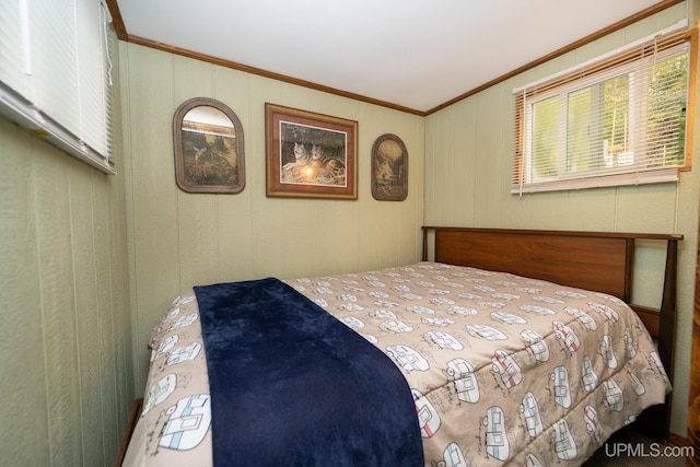 bedroom with ornamental molding