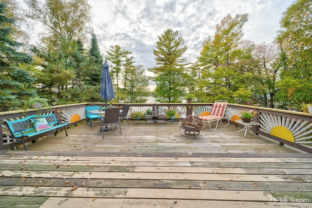 deck with a fire pit