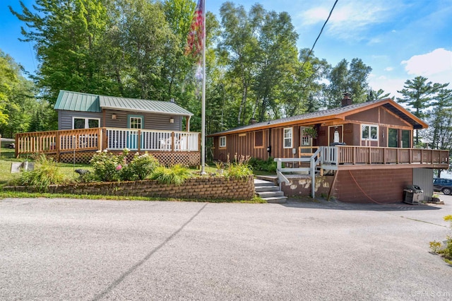 view of front of house with a deck