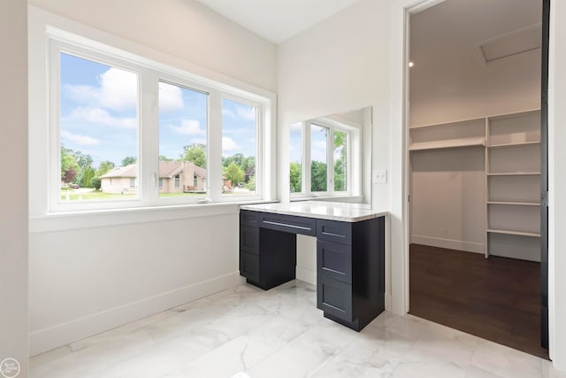 interior space with light stone countertops