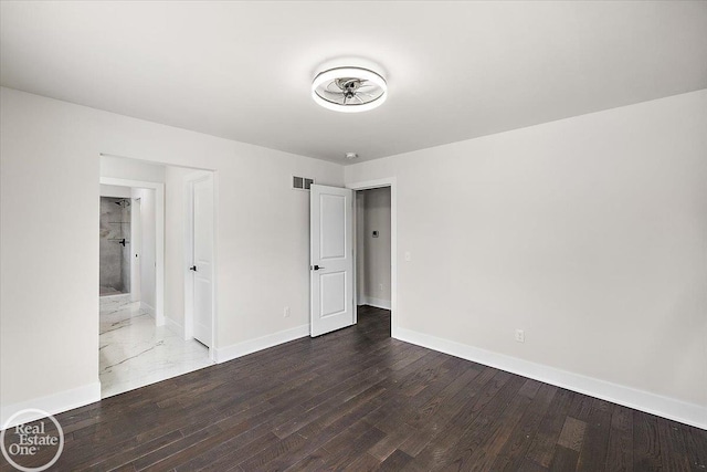 unfurnished bedroom featuring hardwood / wood-style flooring