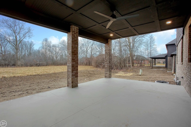 view of patio / terrace featuring ceiling fan