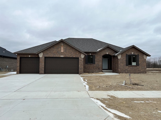 view of front of home with a garage