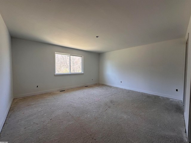 view of carpeted spare room