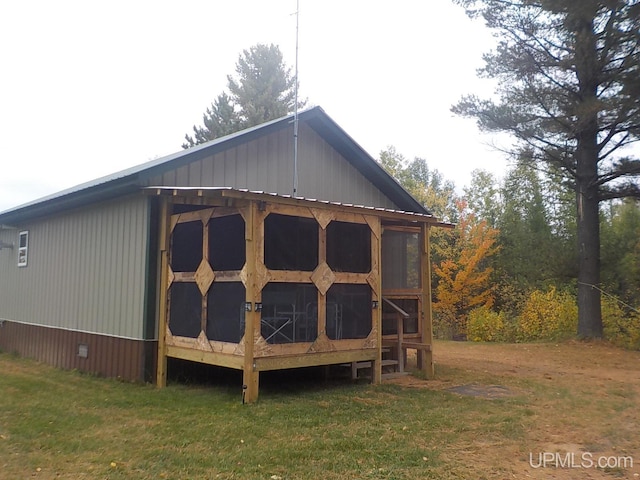 view of shed / structure with a lawn