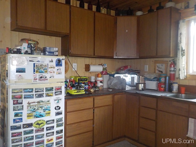 kitchen featuring white fridge