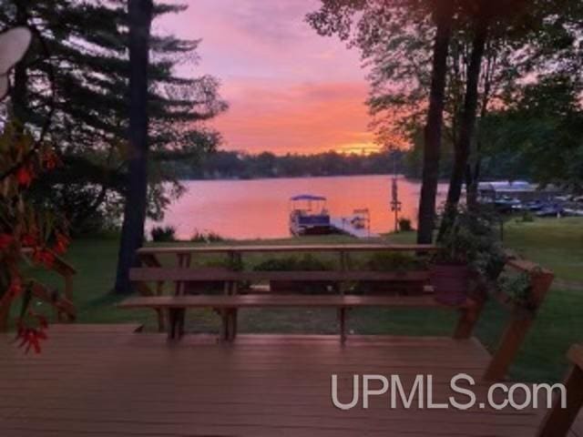 deck at dusk with a water view