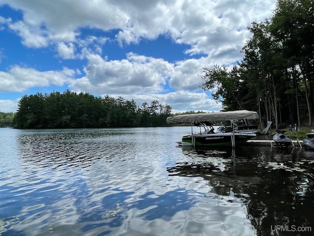 exterior space with a water view