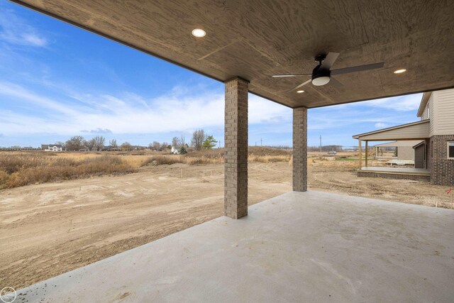 view of patio with ceiling fan