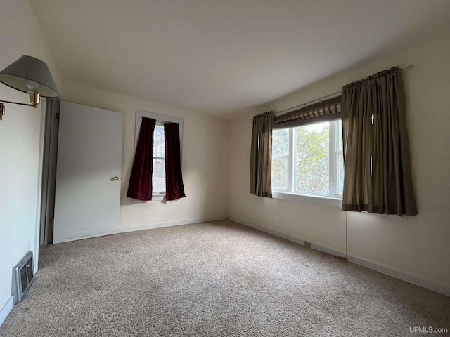 view of carpeted spare room