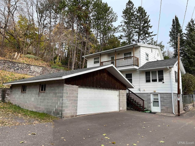 view of front property with a balcony