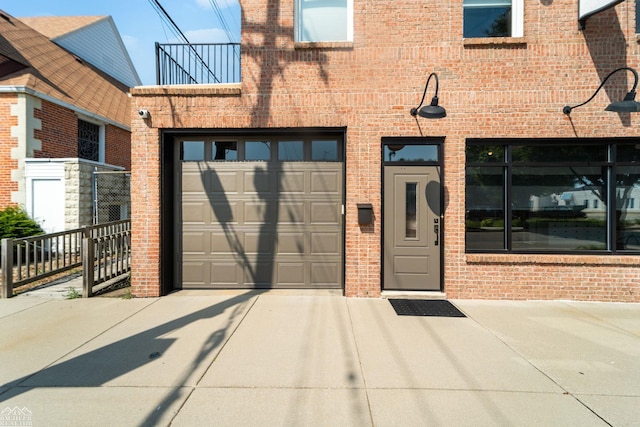 doorway to property featuring a garage