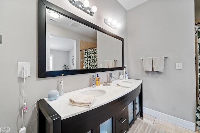 bathroom featuring vanity and tile patterned floors