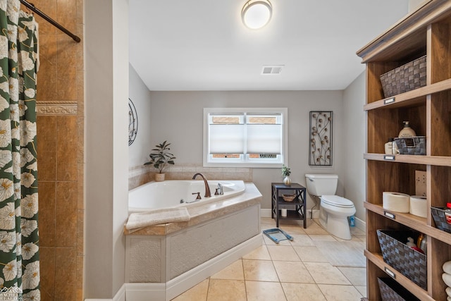 bathroom featuring tile patterned floors, independent shower and bath, and toilet