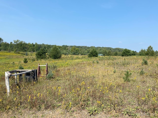 exterior space with a rural view