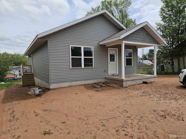 view of front of property featuring covered porch