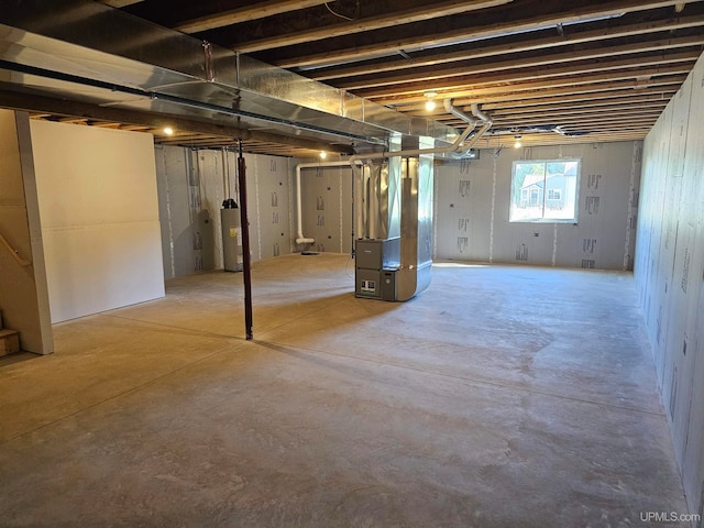 basement with heating unit and gas water heater