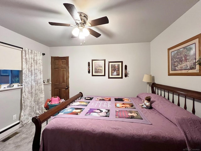 carpeted bedroom featuring ceiling fan and visible vents