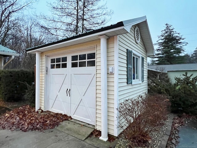 view of outbuilding with a garage