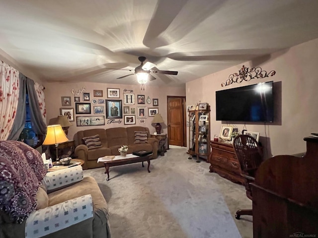 living room with carpet floors and ceiling fan