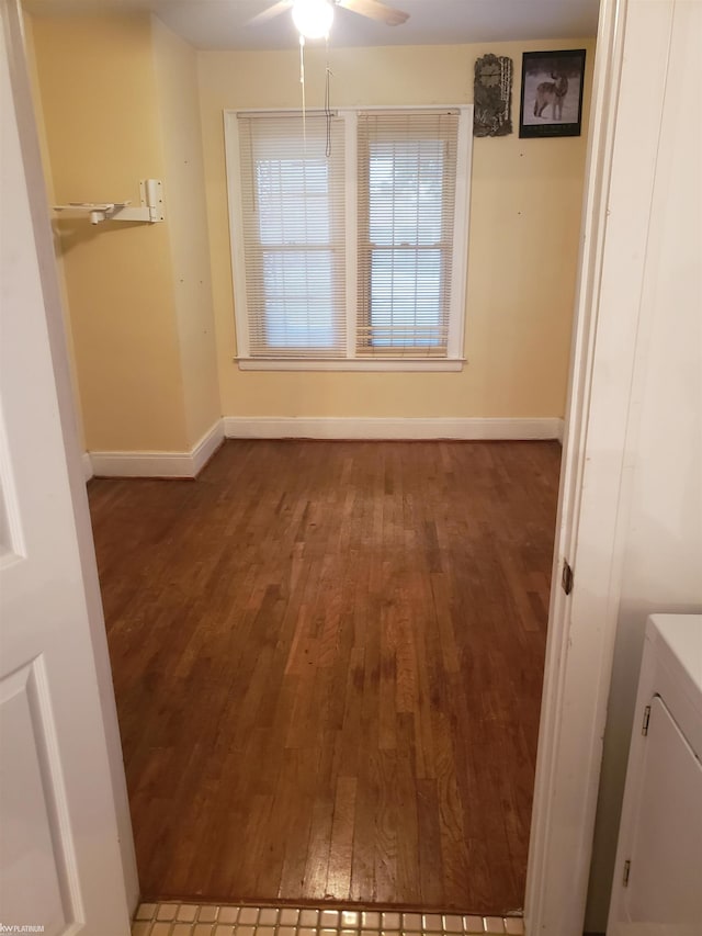 unfurnished room with hardwood / wood-style flooring and ceiling fan