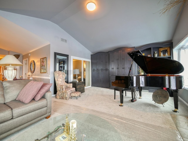 carpeted living room featuring vaulted ceiling