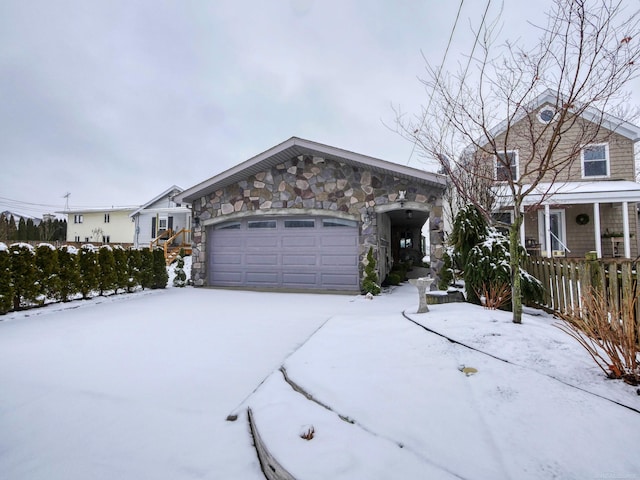 view of front of home with a garage