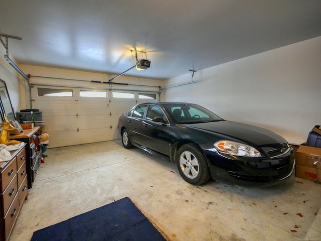 garage featuring a garage door opener