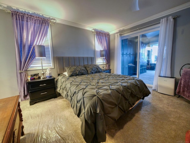 carpeted bedroom with access to outside, ceiling fan, and ornamental molding