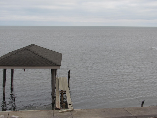 view of dock with a water view