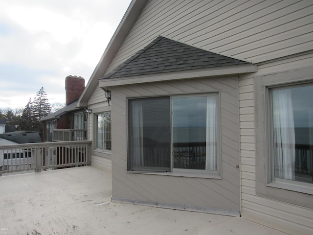 view of side of property with a patio area