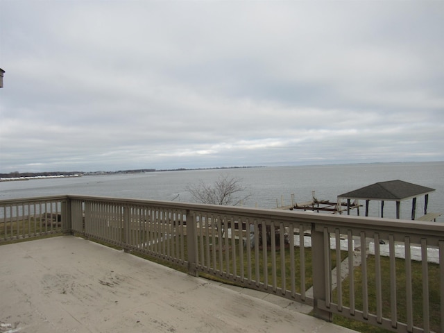 view of patio with a water view