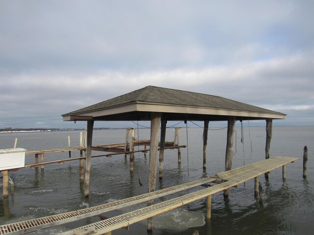 view of dock with a water view