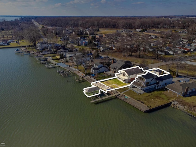 birds eye view of property featuring a water view