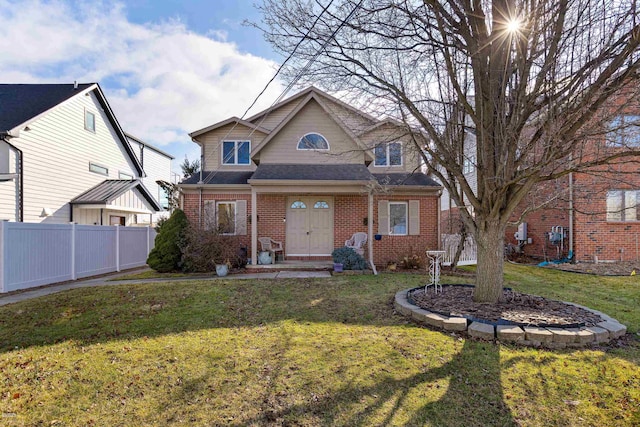 view of front facade featuring a front yard