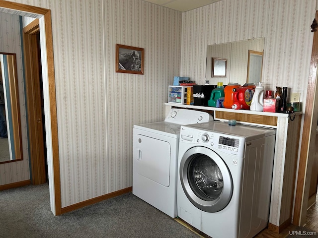 laundry room featuring independent washer and dryer and dark carpet