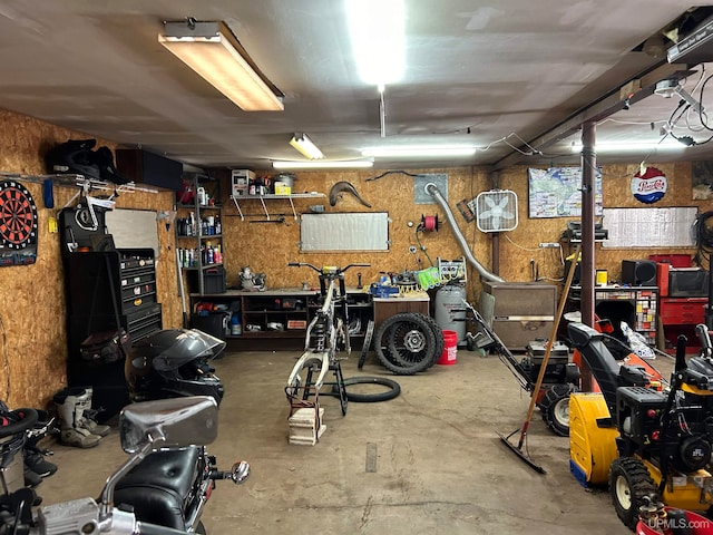 garage with a workshop area