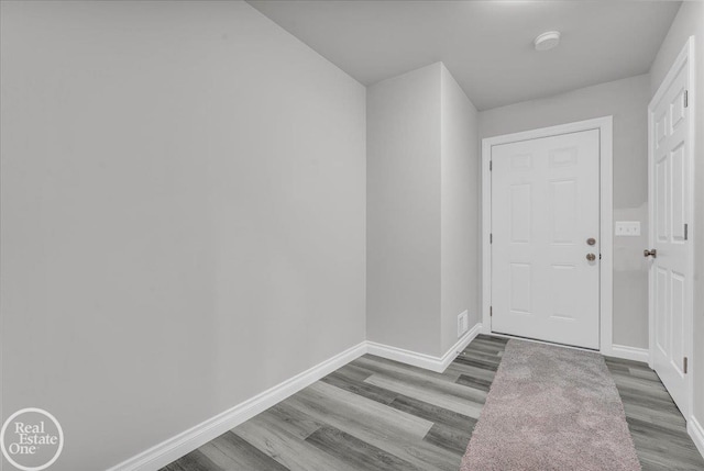 entrance foyer with hardwood / wood-style floors