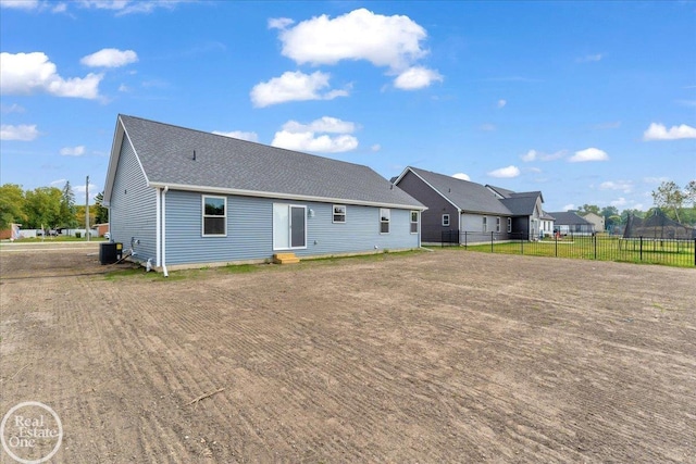 back of house featuring central AC