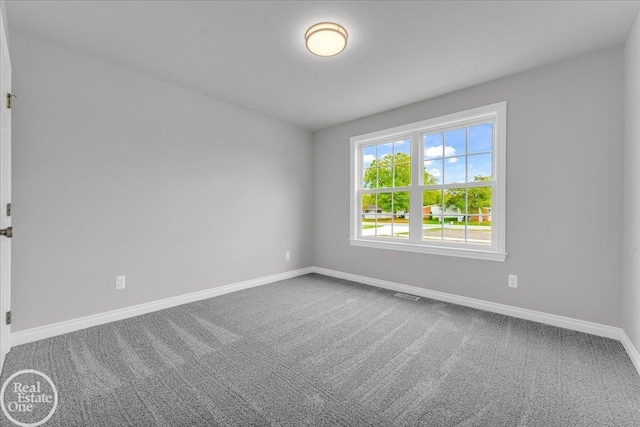 view of carpeted spare room