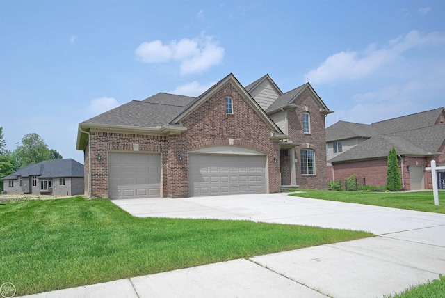 view of front facade with a front lawn and a garage